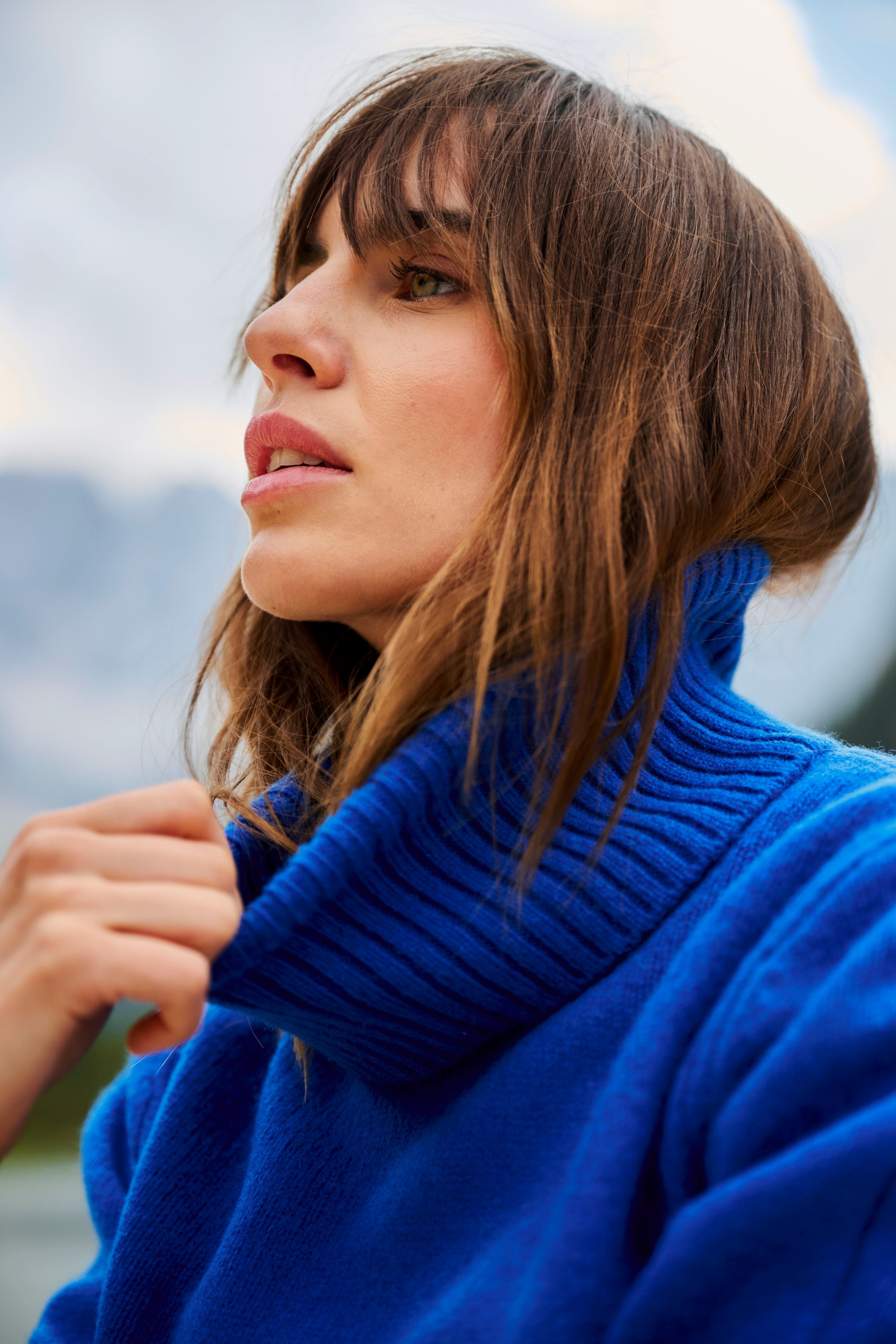 Josephine & Co Model Wearing Blue Sweater